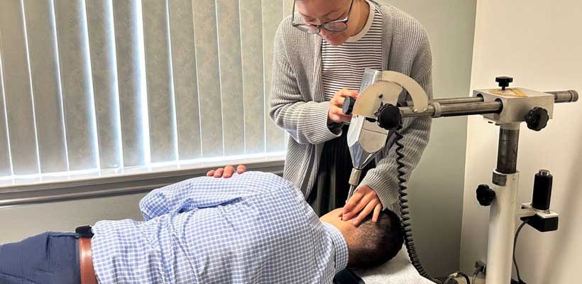 patient receiving atlas orthogonal technique in Orange for auto accident injury relief