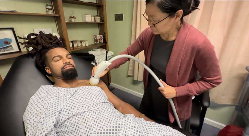 patient receiving softwave therapy in Orange for auto accident injury relief